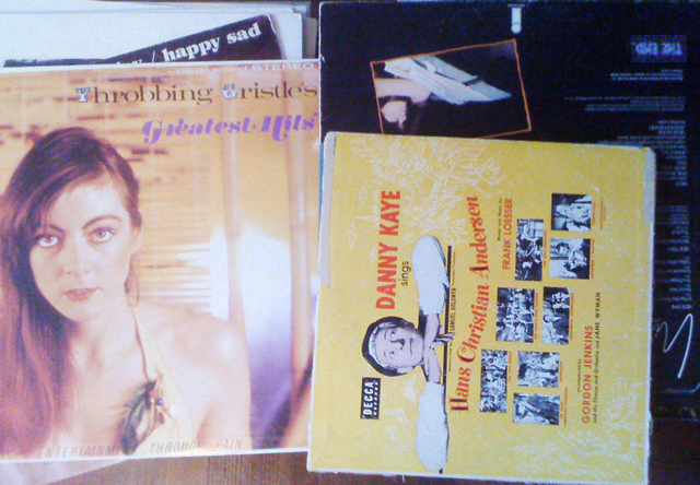 record covers. T.G.'s greatest hits, happy sad, nico and dannt kay